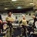 EODMU 5 Fast Ropes in the Hangar Bay of USS George Washington
