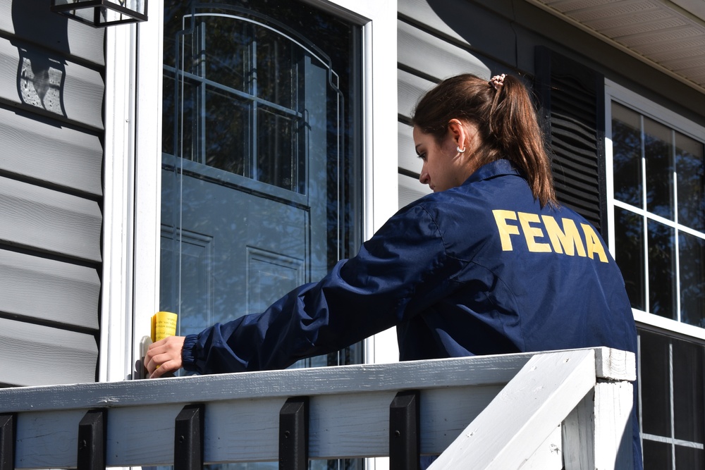 FEMA Specialist Distributes Flyers in Virginia for Disaster Assistance After Hurricane Helene