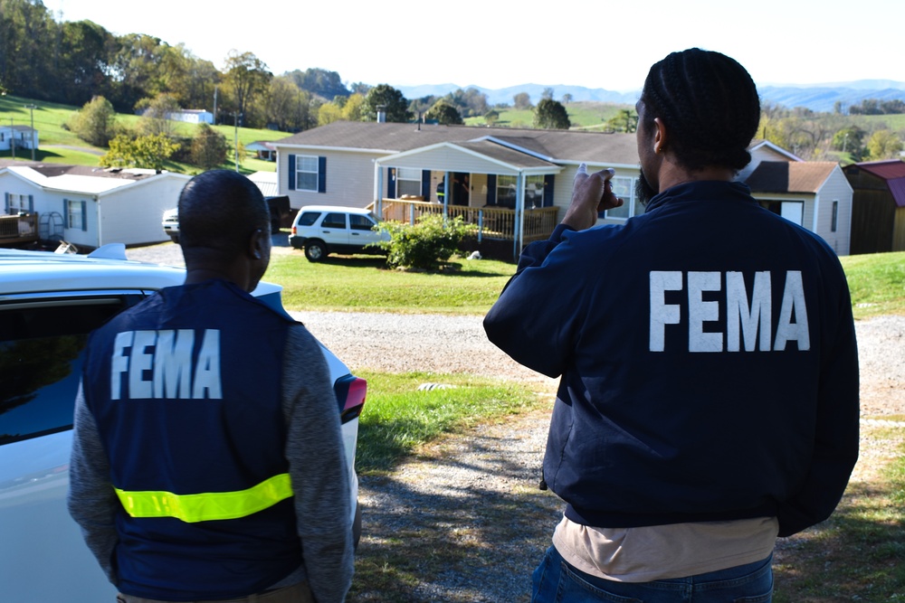 FEMA Specialist Distributes Flyers in Virginia for Disaster Assistance After Hurricane Helene