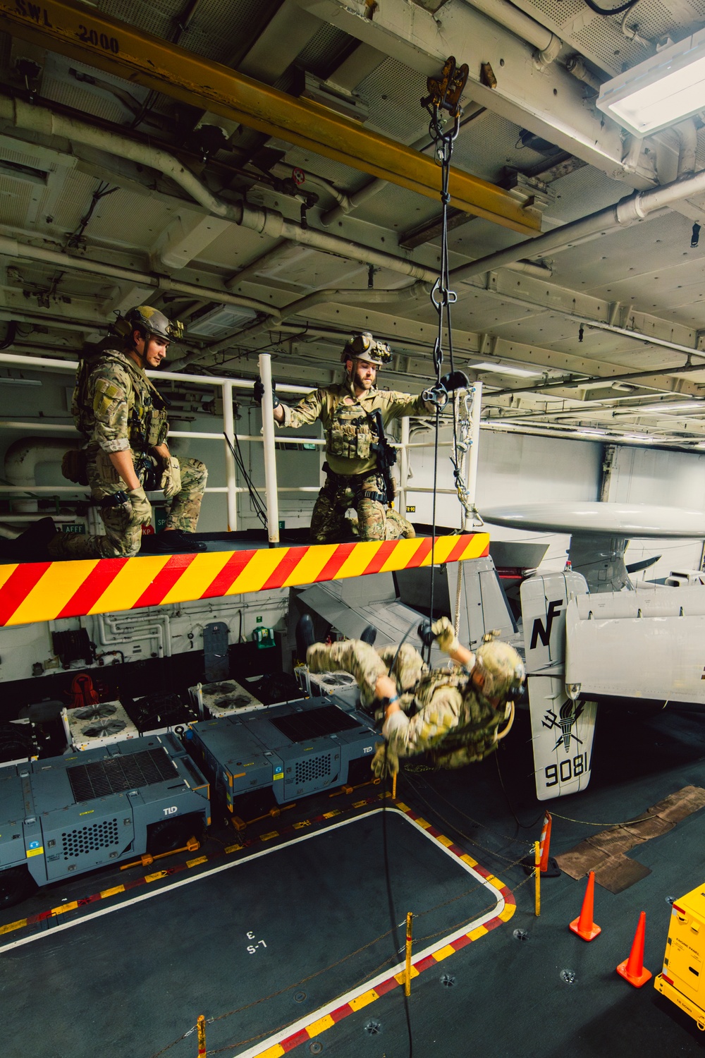DVIDS - Images - EODMU 5 Fast Ropes in the Hangar Bay of USS George ...