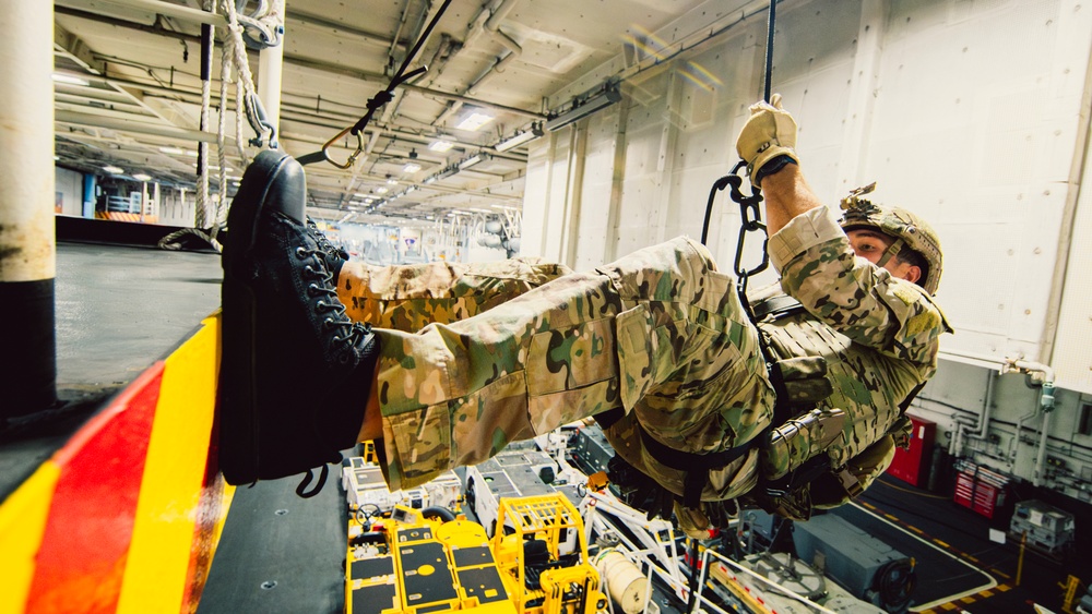 DVIDS - Images - EODMU 5 Fast Ropes in the Hangar Bay of USS George ...
