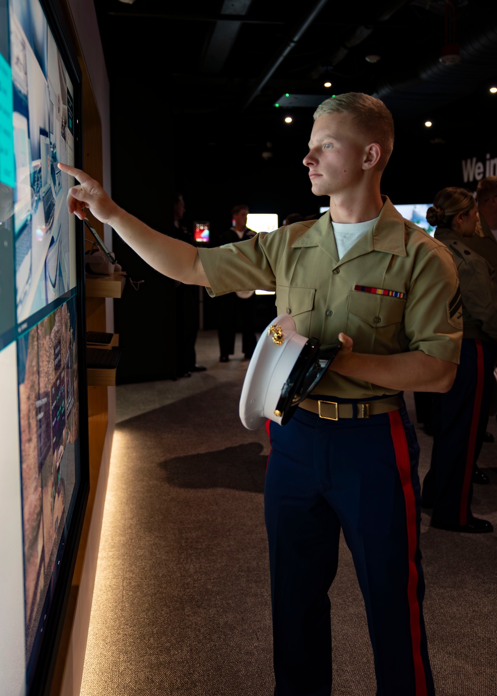 U.S. Sailors and U.S. Marines Work with Technology at the Verizon Innovation Center