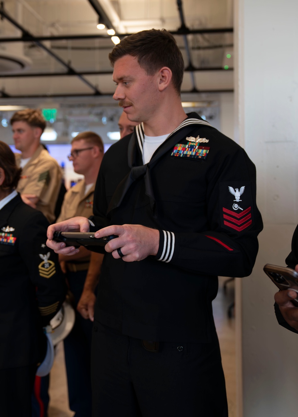 U.S. Navy Sailors Work with Technology at the Verizon Innovation Center