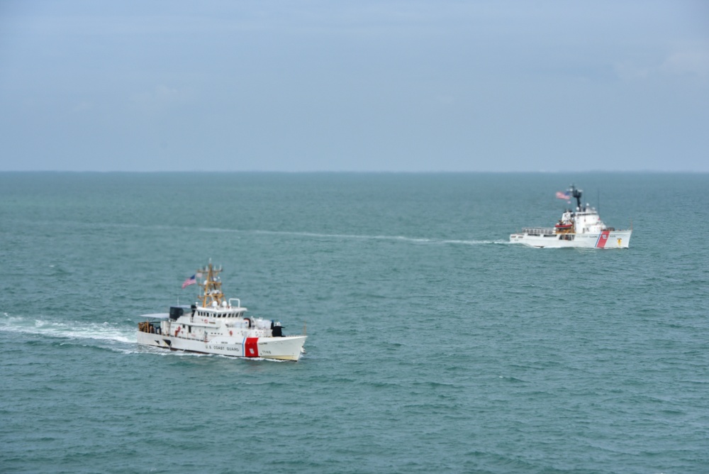 Coast Guard Air Station Miami aircrews fly over cutters in Tampa Bay after Hurricane Milton