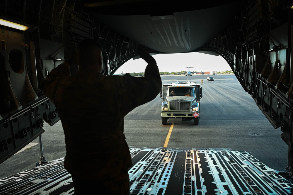 Refueling Hickam's F-22s: A Key Mission for the 62d Airlift Wing in Rainier War 25A