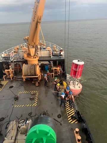 U.S. Coast Guard Cutter Joshua Appleby (WLM 556) personnel work buoys in Tampa Bay after Hurricane Milton