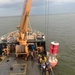 U.S. Coast Guard Cutter Joshua Appleby (WLM 556) personnel work buoys in Tampa Bay after Hurricane Milton