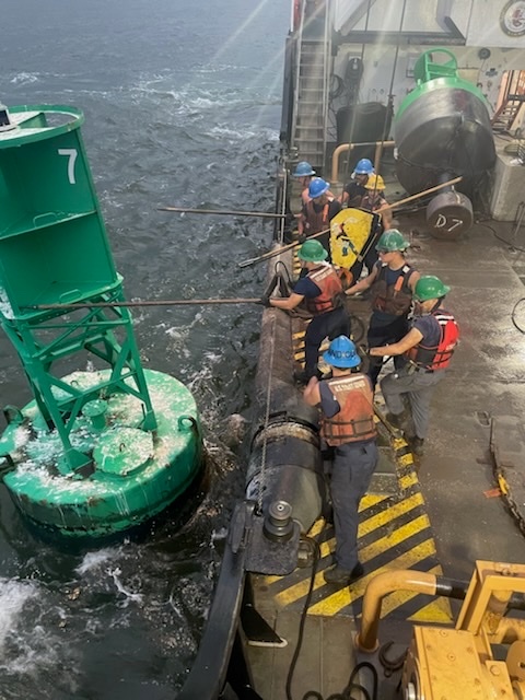 U.S. Coast Guard Cutter Joshua Appleby (WLM 556) personnel work buoys in Tampa Bay after Hurricane Milton