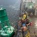 U.S. Coast Guard Cutter Joshua Appleby (WLM 556) personnel work buoys in Tampa Bay after Hurricane Milton