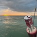 U.S. Coast Guard Cutter Joshua Appleby (WLM 556) personnel work buoys in Tampa Bay after Hurricane Milton