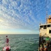 U.S. Coast Guard Cutter Joshua Appleby (WLM 556) personnel work buoys in Tampa Bay after Hurricane Milton