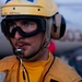 Sailors Move Aircraft on the Flight Deck of USS George Washington