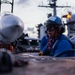 Sailors Move Aircraft on the Flight Deck of USS George Washington
