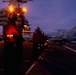 Sailors Move Aircraft on the Flight Deck of USS George Washington