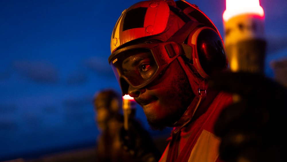 Sailors Move Aircraft on the Flight Deck of USS George Washington