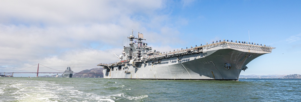 U.S. Navy, Coast Guard and local emergency service ships participate in a Parade of Ships event in the San Francisco Bay