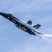 U.S. Navy Flight Demonstration Squadron, the Blue Angels, perform aerobatic formation maneuvers over San Francisco