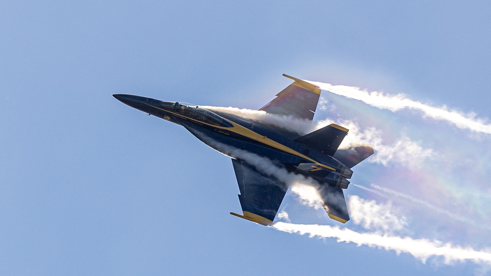 U.S. Navy Flight Demonstration Squadron, the Blue Angels, perform aerobatic formation maneuvers over San Francisco