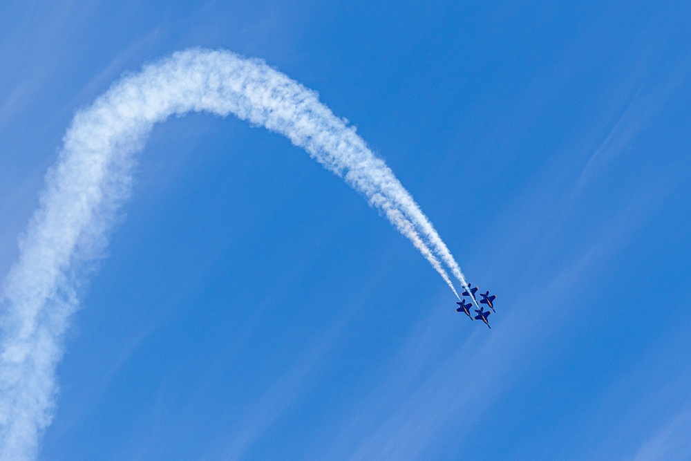 U.S. Navy Flight Demonstration Squadron, the Blue Angels, perform aerobatic formation maneuvers over San Francisco