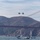 U.S. Navy Flight Demonstration Squadron, the Blue Angels, perform aerobatic formation maneuvers over San Francisco U.S. Navy Flight Demonstration Squadron, the Blue Angels, perform aerobatic formation maneuvers over San Francisco