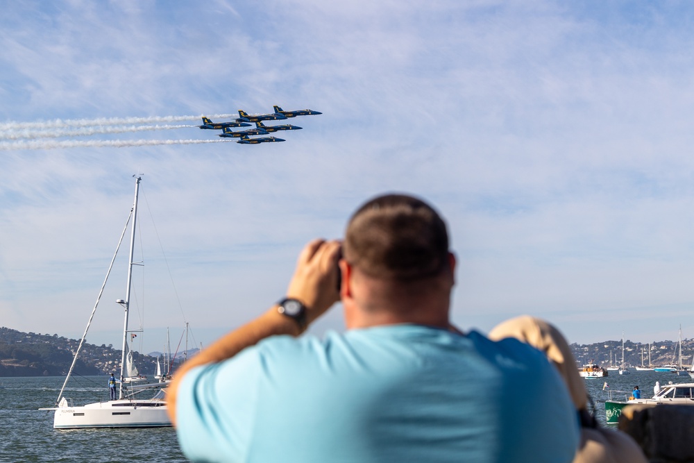 U.S. Navy Flight Demonstration Squadron, the Blue Angels, perform aerobatic formation maneuvers over San Francisco