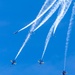 U.S. Navy Flight Demonstration Squadron, the Blue Angels, perform aerobatic formation maneuvers over San Francisco