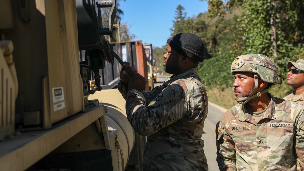 3rd Expeditionary Sustainment Command unload shipping containers in Fairview, North Carolina