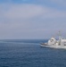 USS Chosin (CG 65) and USNS Washington Chambers (T-AKE-11) conduct a Transferrable Rearming Mechanism (TRAM)