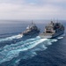 USS Chosin (CG 65) and USNS Washington Chambers (T-AKE-11) conduct a Transferrable Rearming Mechanism (TRAM)