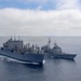 USS Chosin (CG 65) and USNS Washington Chambers (T-AKE-11) conduct a Transferrable Rearming Mechanism (TRAM)