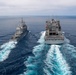 USS Chosin (CG 65) and USNS Washington Chambers (T-AKE-11) conduct a Transferrable Rearming Mechanism (TRAM)