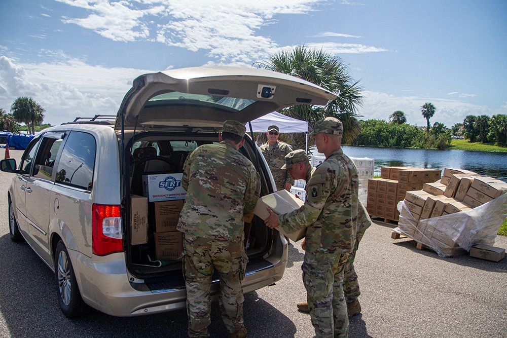 Florida Army National Guard mortarmen distribute emergency supplies after Hurricane Milton