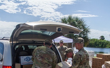 Florida Army National Guard mortarmen distribute emergency supplies after Hurricane Milton