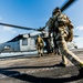 Explosive Ordnance Disposal Technicians Fast-Rope on the Flight Deck of USS George Washington