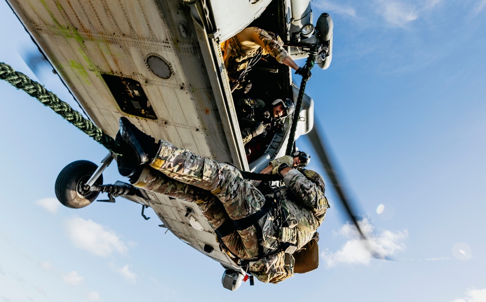 Explosive Ordnance Disposal Technicians Fast-Rope on the Flight Deck of USS George Washington