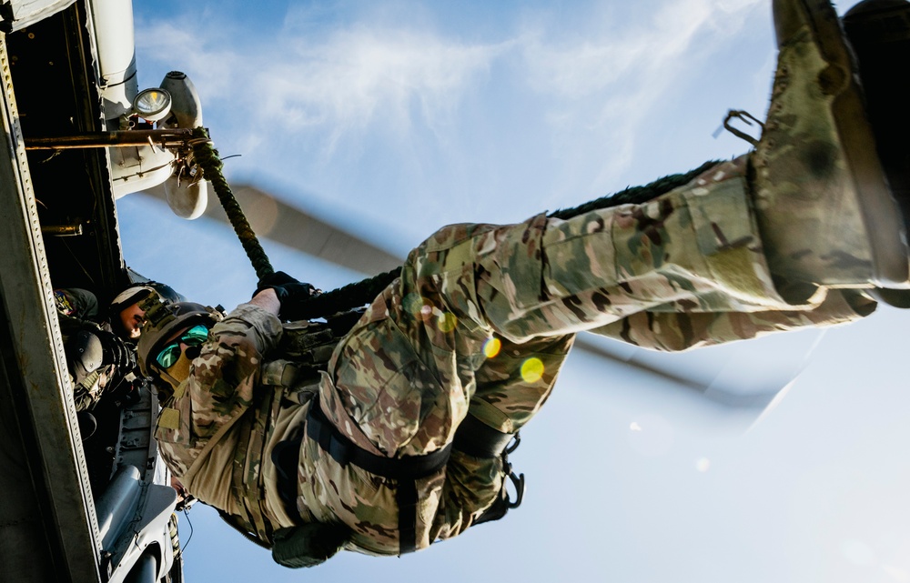 Explosive Ordnance Disposal Technicians Fast-Rope on the Flight Deck of USS George Washington