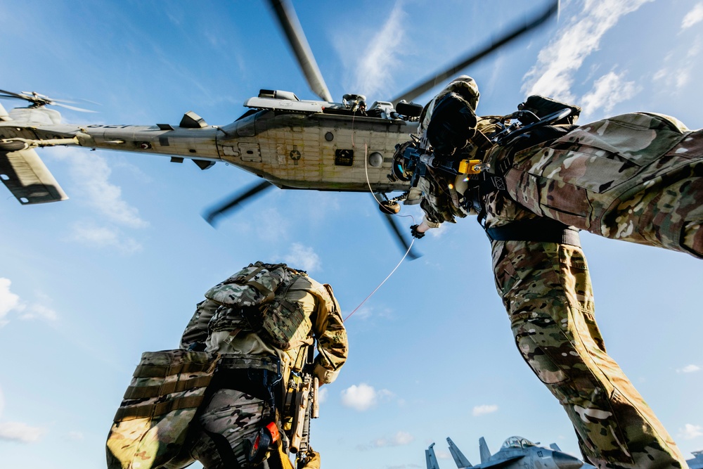 Explosive Ordnance Disposal Technicians Fast-Rope on the Flight Deck of USS George Washington