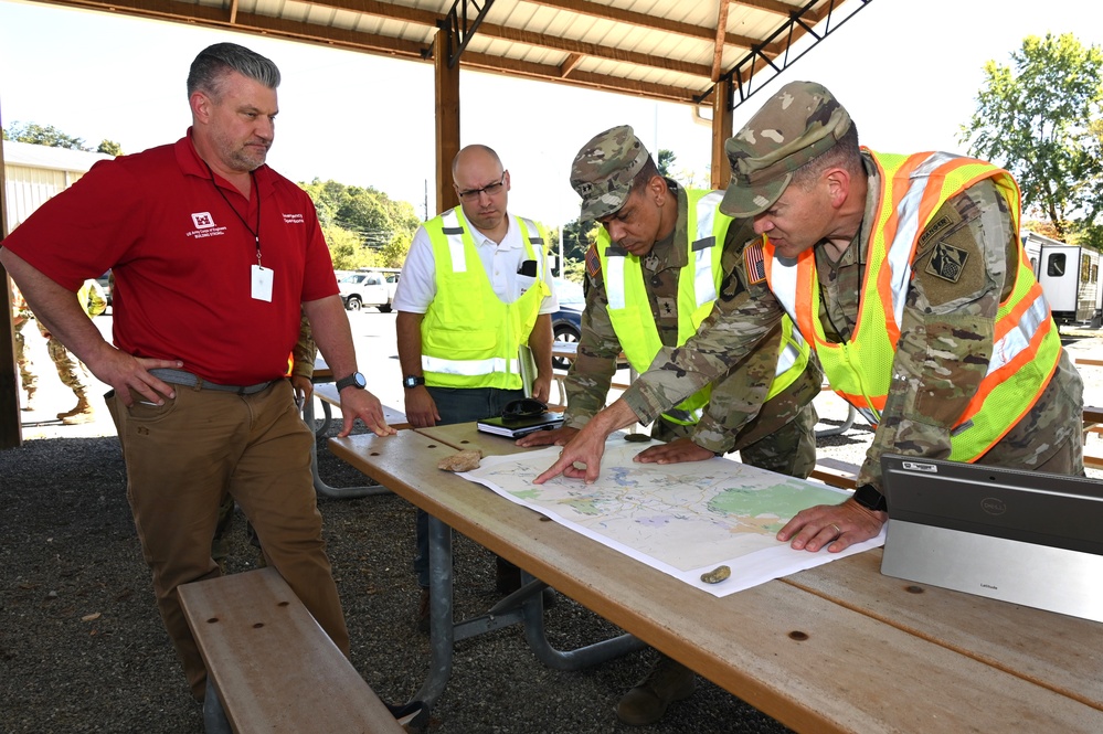 Corps of Engineers personnel review Task Force Water efforts during Hurricane Helene recovery