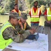 Corps of Engineers personnel review Task Force Water efforts during Hurricane Helene recovery