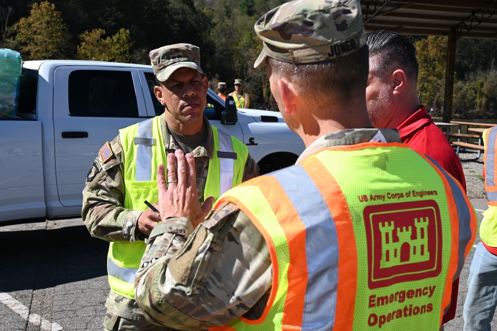 Corps of Engineers personnel review Task Force Water efforts during Hurricane Helene recovery