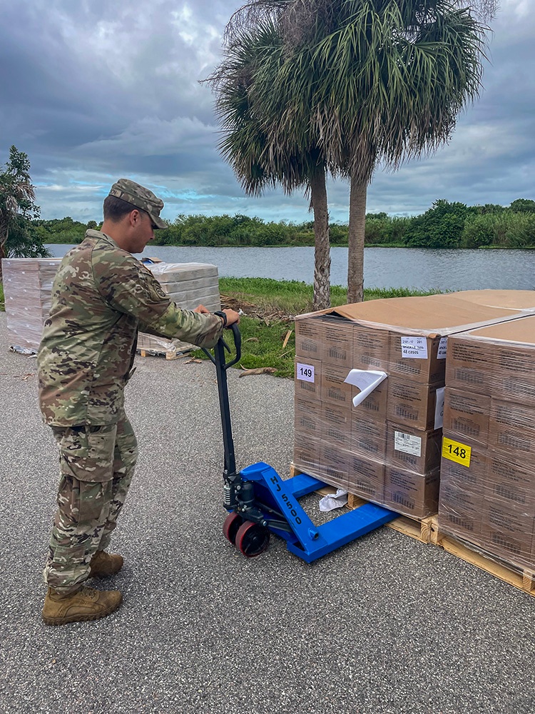 Florida Army National Guard mortarmen set up point-of-distribution site to deliver emergency supplies after Hurricane Milton