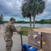 Florida Army National Guard mortarmen set up point-of-distribution site to deliver emergency supplies after Hurricane Milton