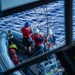 USS George Washington Sailors launch a rigid-hull inflatable boat while underway