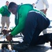 USS George Washington Sailors Repair Catapult Nose Assembly