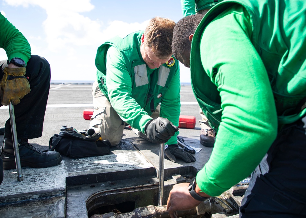 USS George Washington Sailors Repair Catapult Nose Assembly