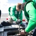 USS George Washington Sailors Repair Catapult Nose Assembly