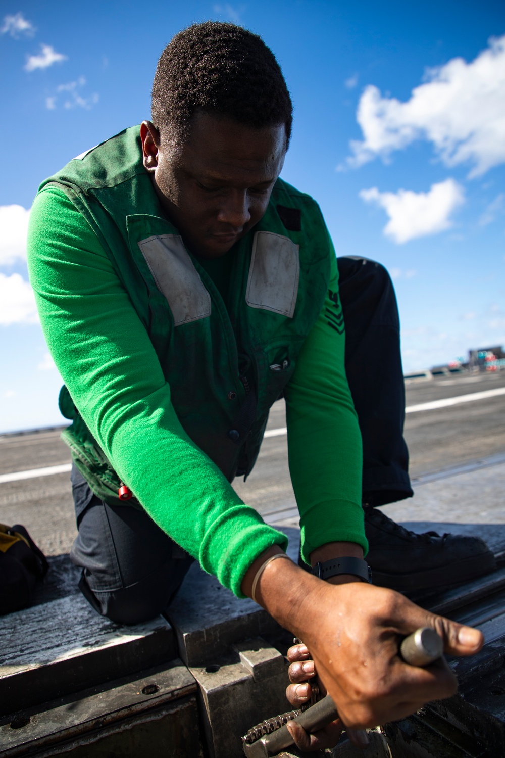 USS George Washington Sailors Repair Catapult Nose Assembly