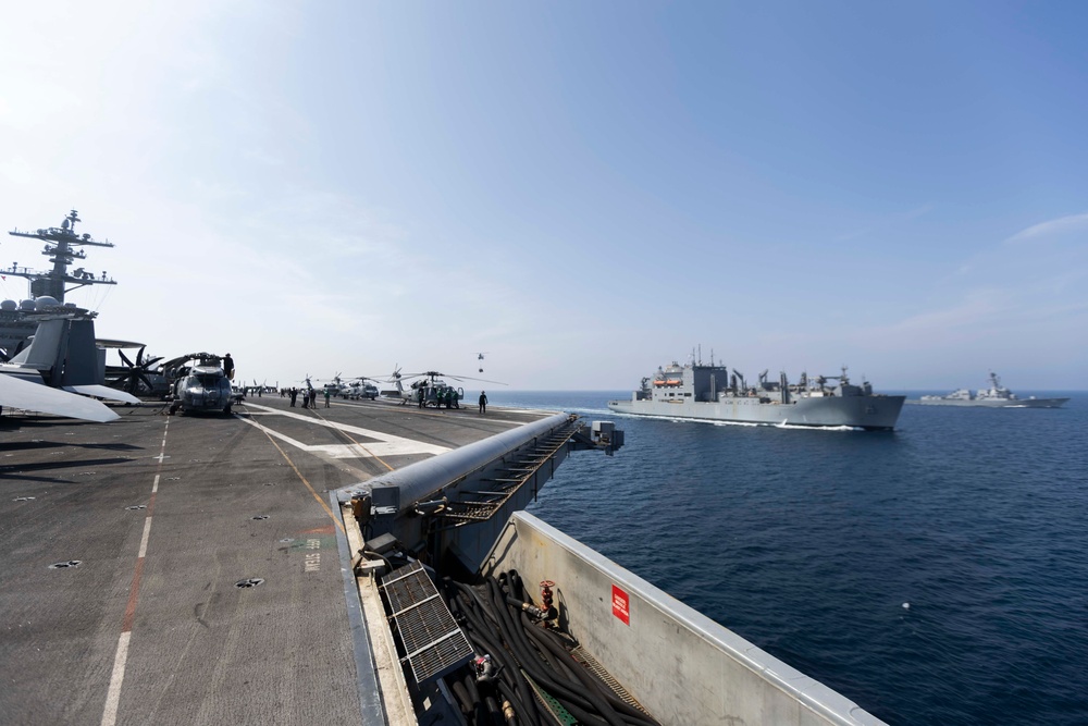 Abraham Lincoln conducts a replenishment-at-sea with Amelia Earhart