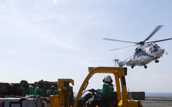 Abraham Lincoln conducts a replenishment-at-sea with Amelia Earhart