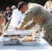 U.S. Army Soldiers assigned to the Bravo Company, 1st Battalion, 325th Airborne Infantry Regiment, 82nd Airborne Division, serve hot meals to local communities.